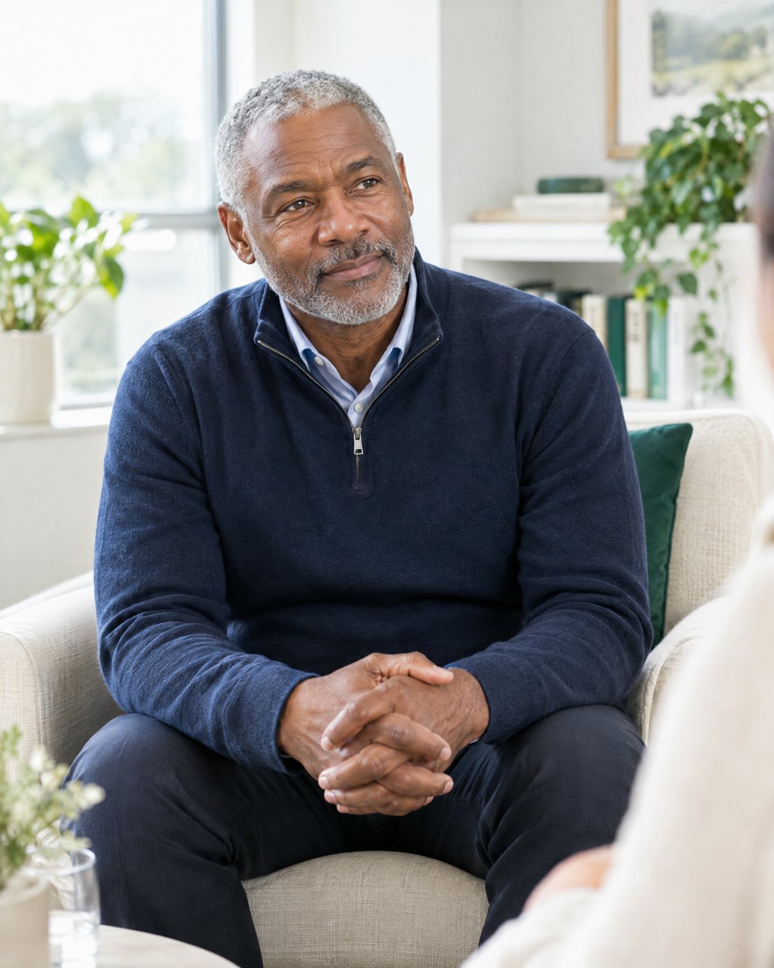 Preventive care for your next chapter A man in his sixties sits comfortably during a care consultation